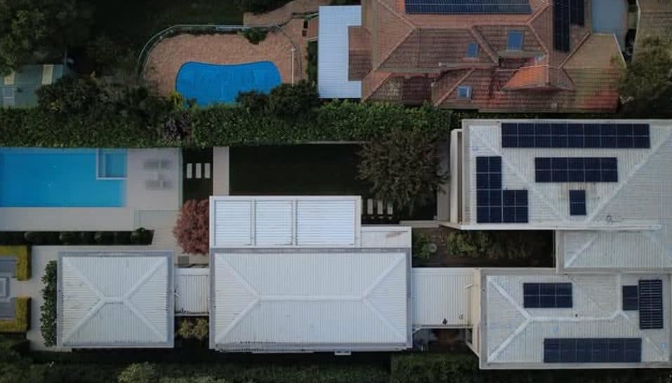 Aerial view of a Sydney street with solar panels on the roofs